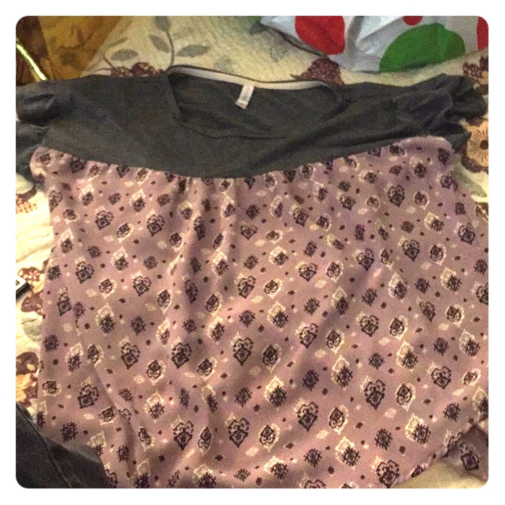 The gray, purple printed shirt